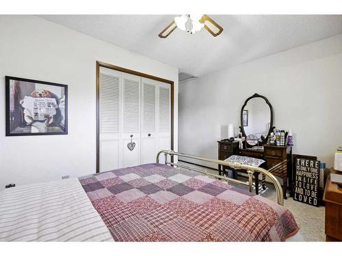 171 Mckenna Way Se, Calgary, AB - Indoor Photo Showing Bedroom