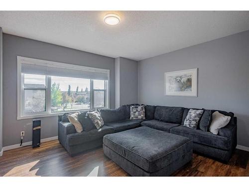 1035 Tuscany Drive Nw, Calgary, AB - Indoor Photo Showing Living Room