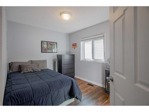 1035 Tuscany Drive Nw, Calgary, AB - Indoor Photo Showing Bedroom