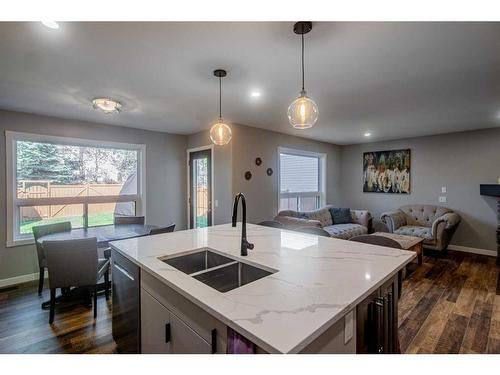 1035 Tuscany Drive Nw, Calgary, AB - Indoor Photo Showing Kitchen With Double Sink