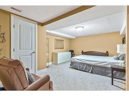 260 Canterville Drive Sw, Calgary, AB - Indoor Photo Showing Bedroom