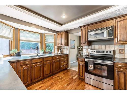 260 Canterville Drive Sw, Calgary, AB - Indoor Photo Showing Kitchen With Double Sink