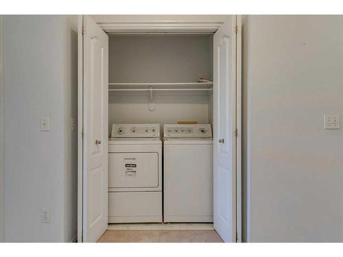 28 Richelieu Court Sw, Calgary, AB - Indoor Photo Showing Laundry Room