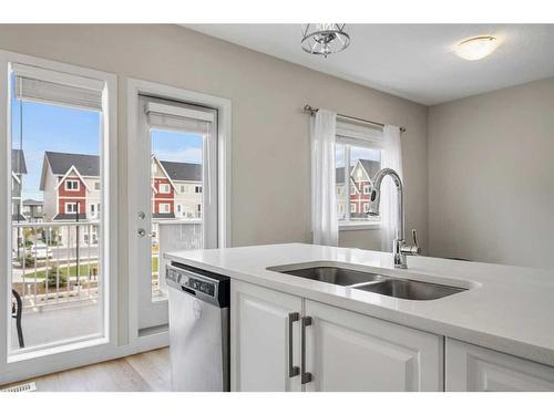 110-32 Red Embers Parade Ne, Calgary, AB - Indoor Photo Showing Kitchen With Double Sink