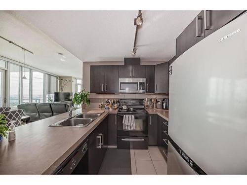 1606-210 15 Avenue Se, Calgary, AB - Indoor Photo Showing Kitchen With Double Sink