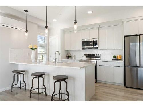 2202-19489 Main Street Se, Calgary, AB - Indoor Photo Showing Kitchen With Stainless Steel Kitchen With Upgraded Kitchen