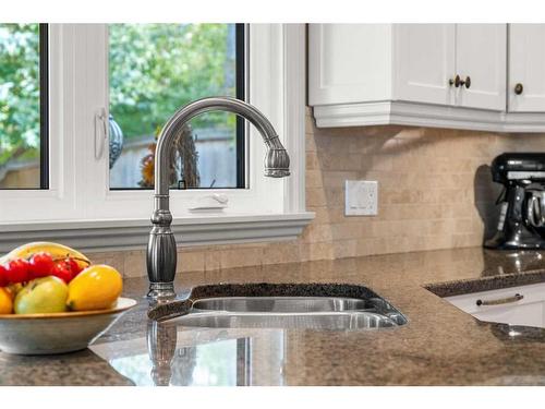 14936 Parkland Boulevard Se, Calgary, AB - Indoor Photo Showing Kitchen With Double Sink