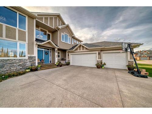 122 Montenaro Crescent, Rural Rocky View County, AB - Outdoor With Facade