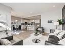 15 Heritage Heights, Cochrane, AB  - Indoor Photo Showing Living Room 