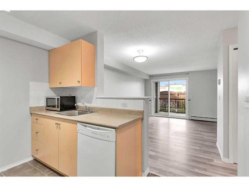 1205-2395 Eversyde Avenue Sw, Calgary, AB - Indoor Photo Showing Kitchen