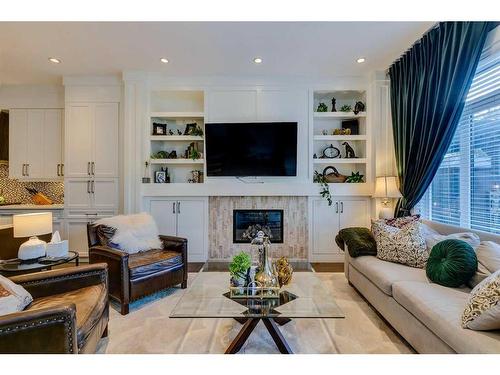 423 23 Avenue Nw, Calgary, AB - Indoor Photo Showing Living Room With Fireplace