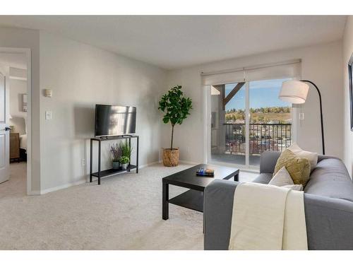 2405-505 Railway Street West, Cochrane, AB - Indoor Photo Showing Living Room