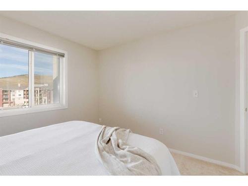 2405-505 Railway Street West, Cochrane, AB - Indoor Photo Showing Bedroom