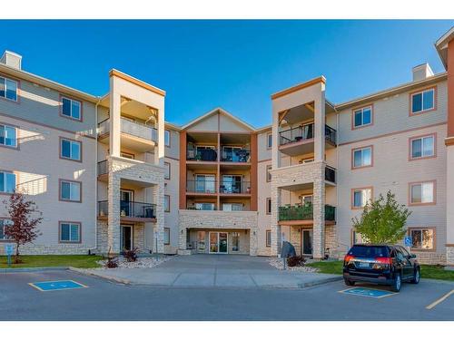 2405-505 Railway Street West, Cochrane, AB - Outdoor With Balcony With Facade