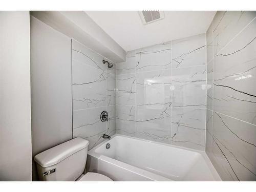 68 Pensville Road Se, Calgary, AB - Indoor Photo Showing Bathroom