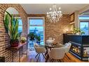 303-41 6 Street Ne, Calgary, AB  - Indoor Photo Showing Dining Room With Fireplace 