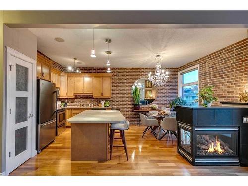 303-41 6 Street Ne, Calgary, AB - Indoor Photo Showing Kitchen With Fireplace