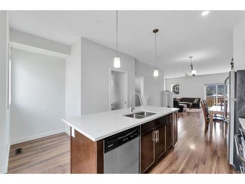 11 Redstone Circle Ne, Calgary, AB - Indoor Photo Showing Kitchen With Double Sink With Upgraded Kitchen