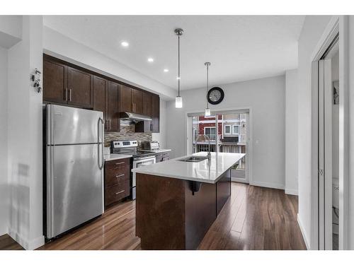 11 Redstone Circle Ne, Calgary, AB - Indoor Photo Showing Kitchen With Stainless Steel Kitchen With Upgraded Kitchen