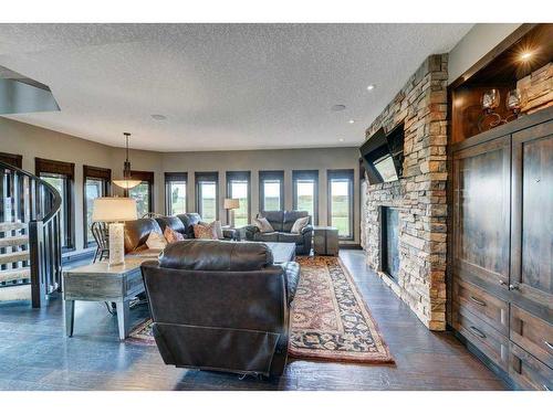 15 Vantage Ridge Estates, Rural Rocky View County, AB - Indoor Photo Showing Living Room With Fireplace