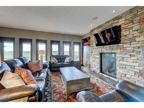 15 Vantage Ridge Estates, Rural Rocky View County, AB - Indoor Photo Showing Living Room With Fireplace