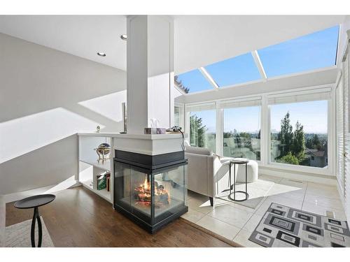 137 Signature Close Sw, Calgary, AB - Indoor Photo Showing Other Room With Fireplace