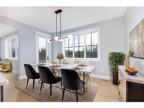 1209 Coopers Drive Sw, Airdrie, AB - Indoor Photo Showing Dining Room