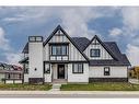 1209 Coopers Drive Sw, Airdrie, AB  - Outdoor With Facade 