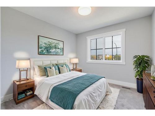 1209 Coopers Drive Sw, Airdrie, AB - Indoor Photo Showing Bedroom