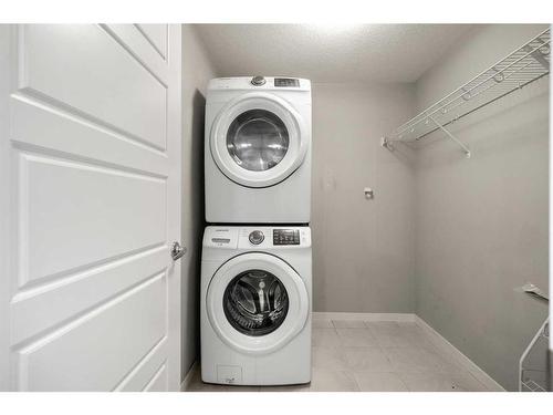 204-360 Harvest Hills Common Ne, Calgary, AB - Indoor Photo Showing Laundry Room