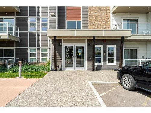 204-360 Harvest Hills Common Ne, Calgary, AB - Outdoor With Balcony With Facade