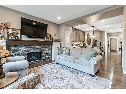 83 Masters Avenue Se, Calgary, AB - Indoor Photo Showing Living Room With Fireplace