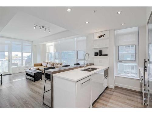 410-138 Waterfront Court Sw, Calgary, AB - Indoor Photo Showing Kitchen With Double Sink With Upgraded Kitchen