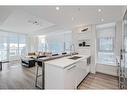 410-138 Waterfront Court Sw, Calgary, AB  - Indoor Photo Showing Kitchen With Double Sink With Upgraded Kitchen 