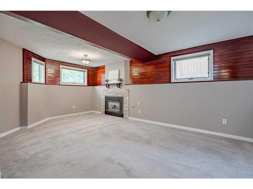 106 Harvest Wood Way Ne, Calgary, AB - Indoor With Fireplace