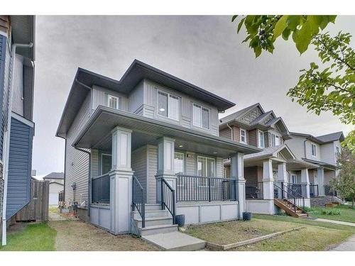 2469 Ravenswood View Se, Airdrie, AB - Outdoor With Deck Patio Veranda With Facade