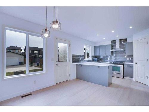 2469 Ravenswood View Se, Airdrie, AB - Indoor Photo Showing Kitchen