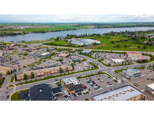 117 Rainbow Falls Manor, Chestermere, AB - Outdoor With Body Of Water With View