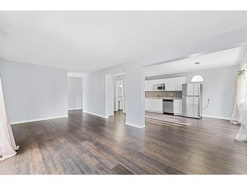 217 Pinestream Place Ne, Calgary, AB - Indoor Photo Showing Living Room