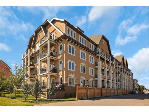 312-30 Mahogany Mews Se, Calgary, AB - Outdoor With Balcony With Facade