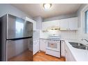 4546 7 Avenue Se, Calgary, AB  - Indoor Photo Showing Kitchen With Double Sink 