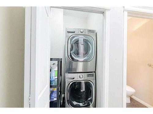 62 Discovery Heights Sw, Calgary, AB - Indoor Photo Showing Laundry Room