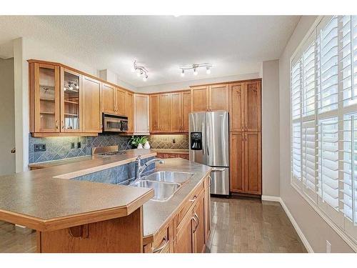 62 Discovery Heights Sw, Calgary, AB - Indoor Photo Showing Kitchen With Stainless Steel Kitchen With Double Sink