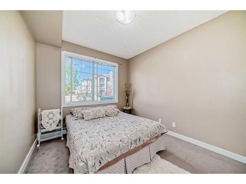 104-22 Panatella Road Nw, Calgary, AB - Indoor Photo Showing Bedroom