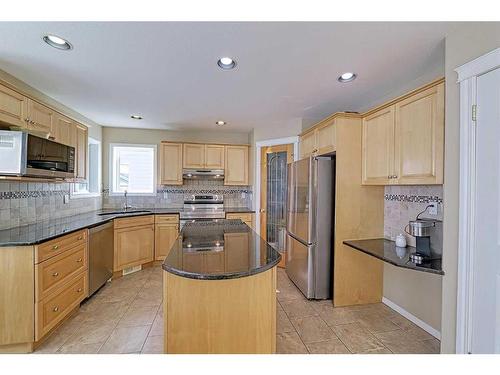 86 Arbour Stone Crescent Nw, Calgary, AB - Indoor Photo Showing Kitchen With Stainless Steel Kitchen