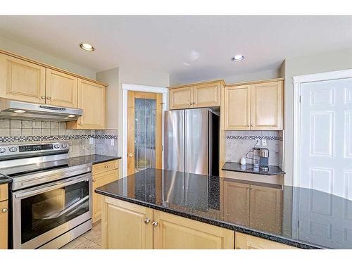 86 Arbour Stone Crescent Nw, Calgary, AB - Indoor Photo Showing Kitchen With Stainless Steel Kitchen