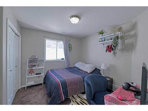 86 Arbour Stone Crescent Nw, Calgary, AB - Indoor Photo Showing Bedroom