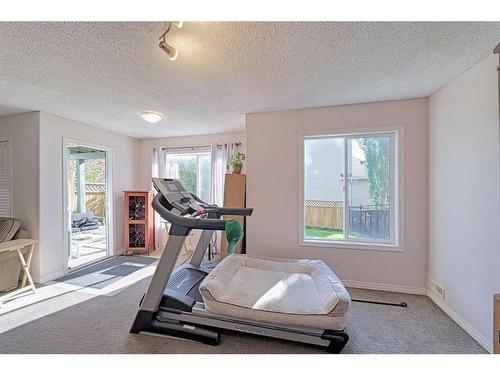 86 Arbour Stone Crescent Nw, Calgary, AB - Indoor Photo Showing Gym Room