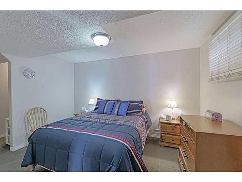 86 Arbour Stone Crescent Nw, Calgary, AB - Indoor Photo Showing Bedroom