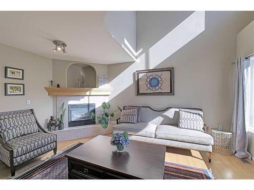 86 Arbour Stone Crescent Nw, Calgary, AB - Indoor Photo Showing Living Room With Fireplace